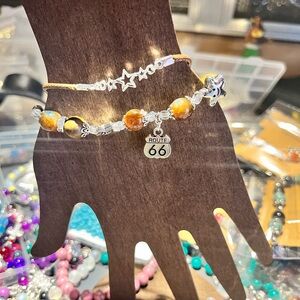 Route 66 Silver and Orange Star Charm Bracelet